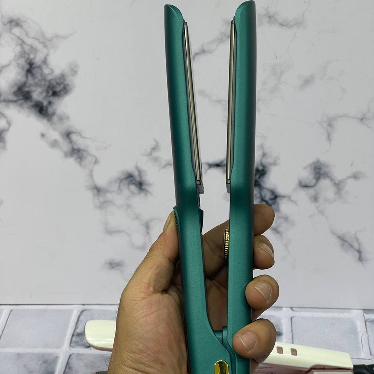اتومو فیلیپس مخصوص کار کراتینه(تضمینی) بسیار حرفه ای و سالنی شلاقی کردن مو فقط با یکبار کشیدن جنس صفحات تیتانیوم